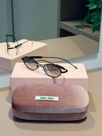 Óculos Oval Preto - MIU MIU