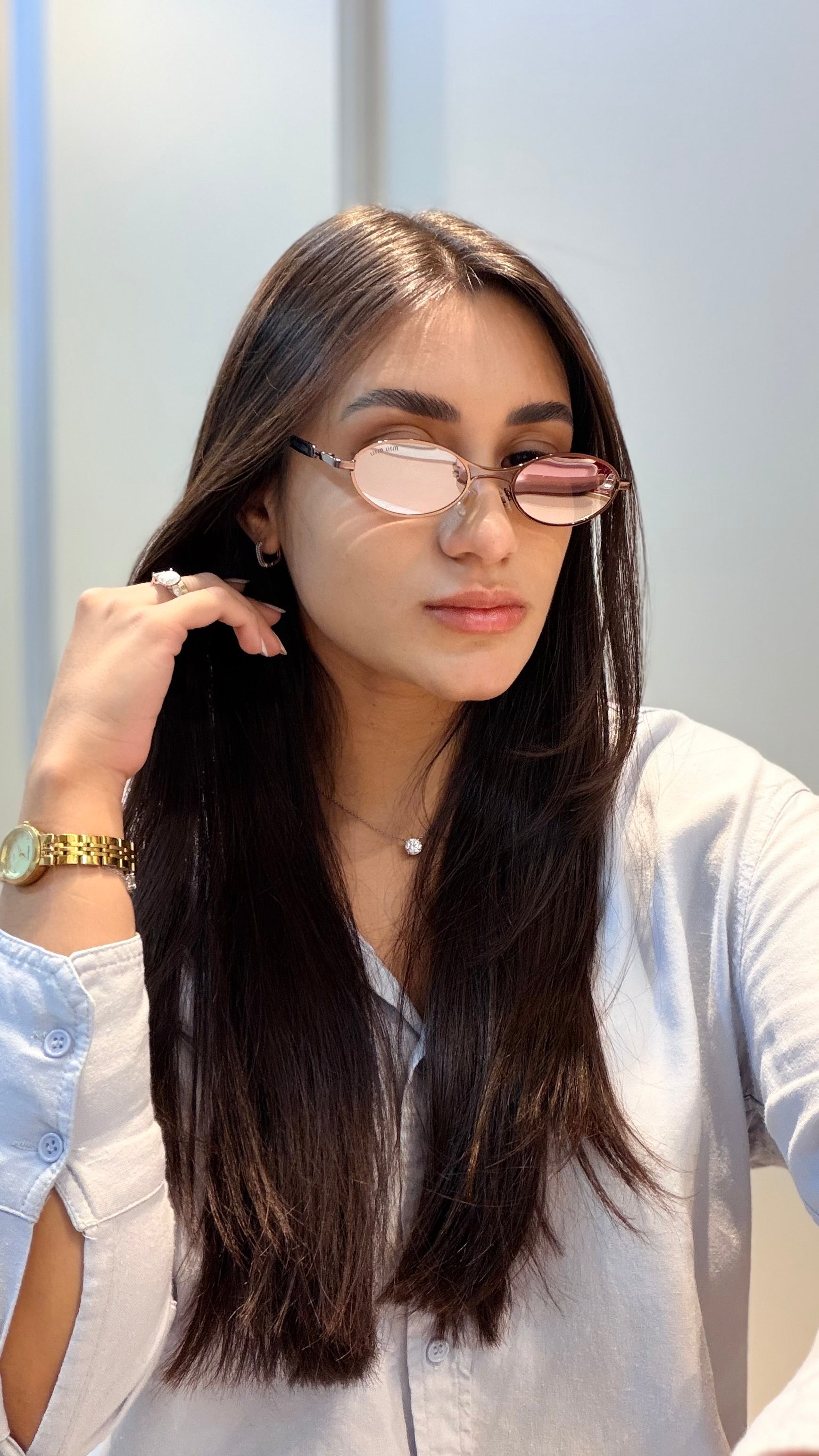 Óculos Oval Marrom - MIU MIU