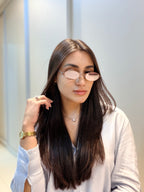 Óculos Oval Marrom - MIU MIU