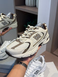 Tênis 530 Off e Marrom - NEW BALANCE