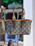 Bolsa de mão ou Transversal GG Emblem Mini - GUCCI