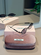 Óculos Oval Preto - MIU MIU