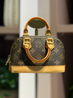 Bolsa de mão ou Transversal Alma Nano - LOUIS VUITTON